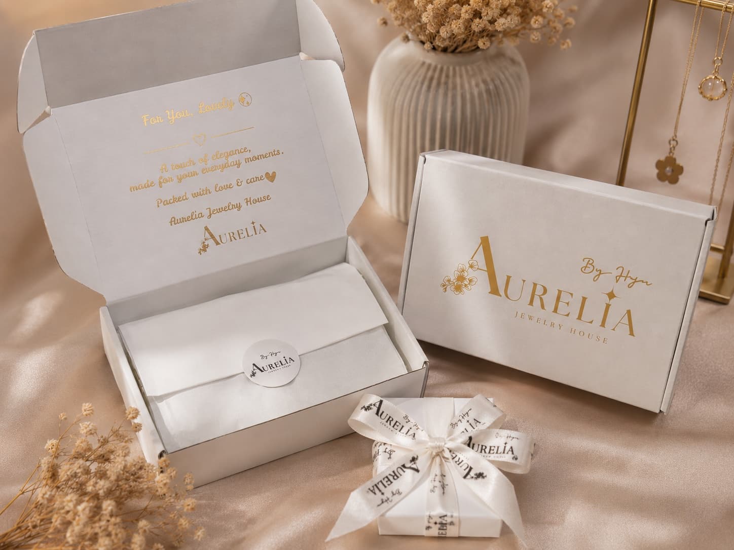 Coffret d'expédition Aurelia avec message doré à l'intérieur